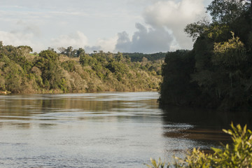Beautiful morning at a rural landscape with river. Blue sky with clouds. Frei Rogério, Santa...