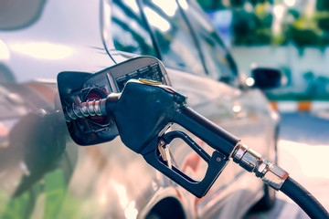 Car refuel in gas station