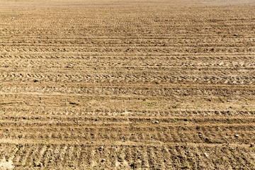 traces on plowed field
