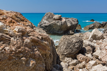 Fototapeta na wymiar Amazing landscape of blue waters of Megali Petra Beach, Lefkada, Ionian Islands, Greece