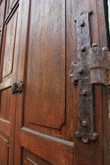 Fototapeta na wymiar old brown door hinge
