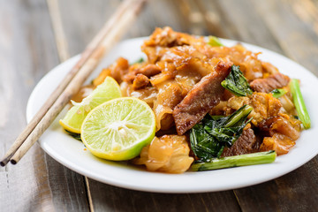 Thai food, stir fried rice noodles in soy sauce (Pad See Ew)
