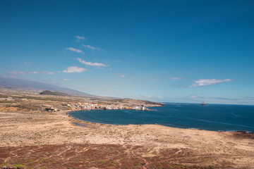 Tenerife south coastline view from the top of the red mountain volcano peak