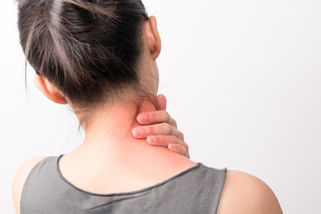 closeup women neck and shoulder pain/injury with red highlights on pain area with white...