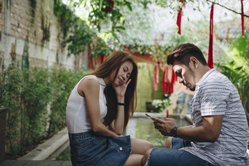 Man playing with his phone