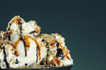 Piece of chocolate almond cornmeal cake with balsamic drizzle and ice cream