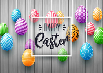 Colorful easter eggs and frame square decorated cute doodle on wood background