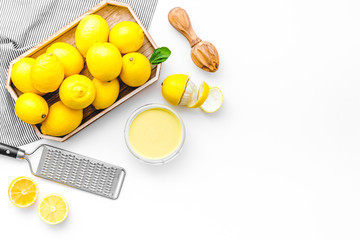 healthy sweet curd cooking with lemons on kitchen white background top view mock up