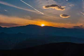 Colorful bright sunset in the mountains