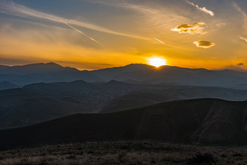 Colorful bright sunset in the mountains