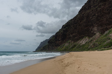 Fototapeta na wymiar Remote beach at the edge of the Napali Coast on Kauai, Hawaii, in winter