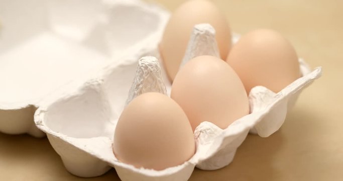 Pick one chicken egg from paper pack