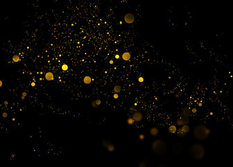Fototapeta na wymiar Gold glittering star light and bokeh.Magic dust abstract background element for your product.