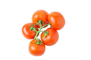 fresh tomatoes with green leaves isolated on white background