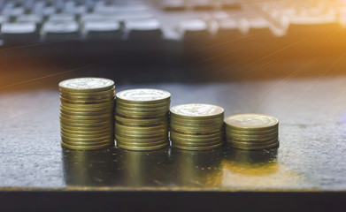 gold coin set isolate on keyboard background