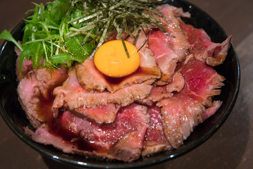  Japanese gyudon raw beef on a rice topping with raw egg, Osaka, Japan