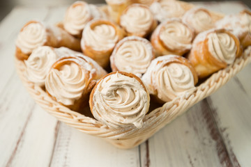 Obraz na płótnie Canvas puff pastry rolls with cream