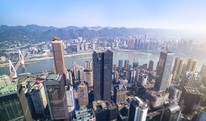 A bird's eye view of the skyline and architectural landscape of the Chongqing river at sunset