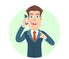 Businessman pointing his finger at the mobile phone that he talks