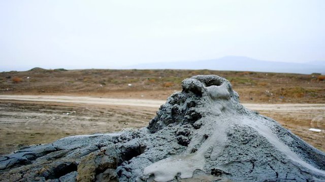 Gas burning from small mud volcano in Gobustan near Baku, Azerbaijan