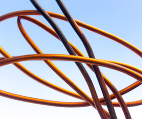 Copper wire against the blue sky