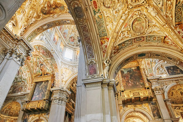 Bergamo, Italy - August 18, 2017: Bergamo's Basilica di Santa Maria Maggiore, ornate gold interior.