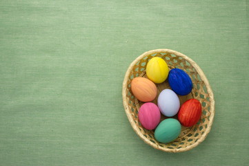 Easter eggs in yello basket on green background fabric S1V2