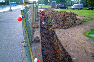 repair trench with fence in the morning 