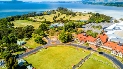Aerial view on Rotorua Museum with lake and hill on the background. Rotorua, New Zealand - obrazy, fototapety, plakaty