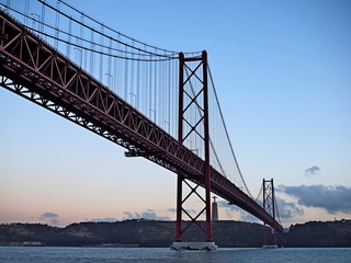 Fototapeta na wymiar 25th of April Suspension Bridge over the Tagus river in Lisbon, Portugal 