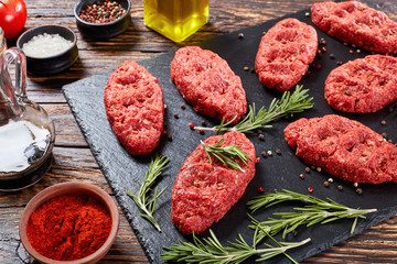 salisbury beef steak on black stone plate