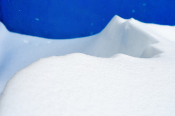 snow dunes on a blue background