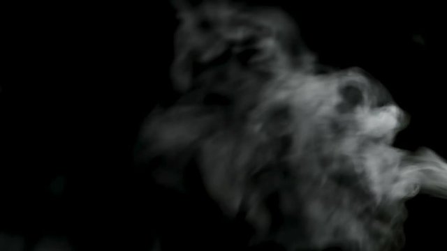smoke coming from the right side against black background