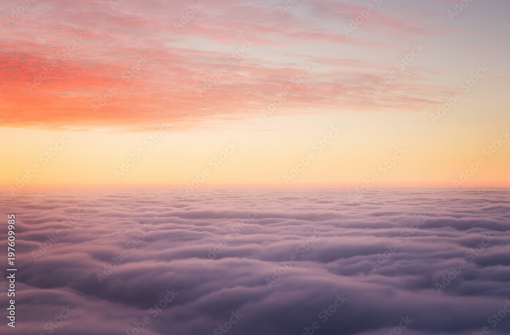 Poster sunset above the clouds with copy space