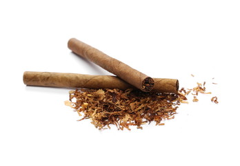 Cigarillos and tobacco pile isolated over white background
