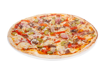 Pizza whole round, cut into pieces, on a white isolated background. Fast food in a pizzeria, a floury cheese product. Side view