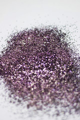 pink purple glitter sparkle on white background