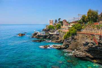Seascape with the Mediterranean rocky coastline and promenade at Genoa Nervi, Liguria, Italy