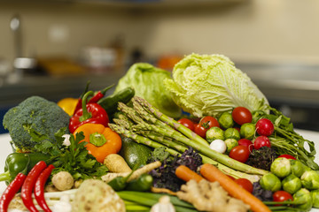 Group of various vegetables on the kitchen board