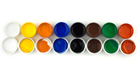 isolated jars with paints on white background