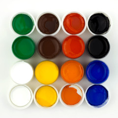 isolated jars with paints on white background