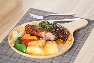 Rip barbecue with baby corn, bell pepper and pineapple grill.