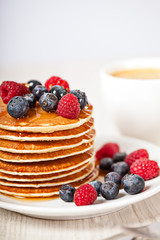 Stack of pancakes with berries breakfast