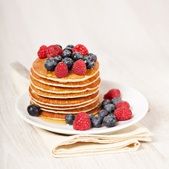 Stack of pancakes with berries breakfast