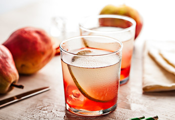 Cold summer cocktail drink with pear