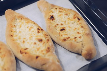Freshly baked traditional khachapuri.
