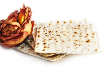 Matza and rose isolation on white