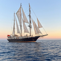 Luxury yacht at sunset. Yachting. Sailing