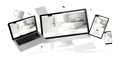 office stuff and devices floating with grand hotel website