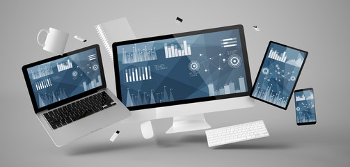 office stuff and devices floating with stats and financial data